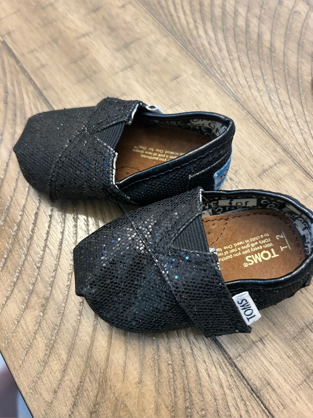 Size 2 Toddler girl TOMS Black Glitter Slip-On Shoes